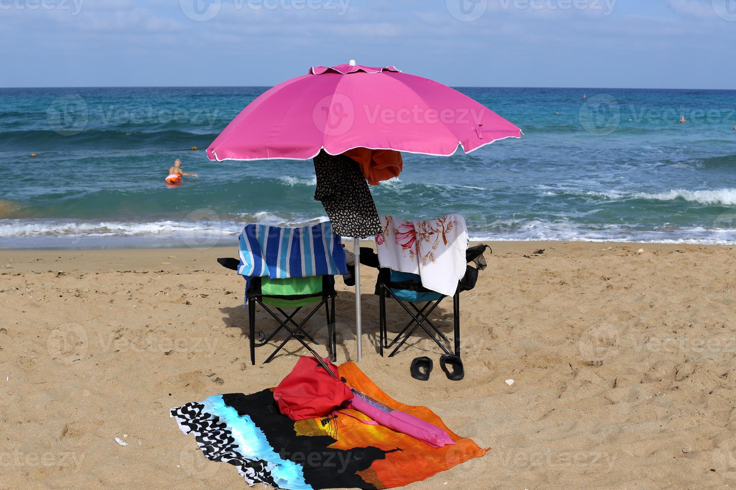 Umbrella to protect from the hot sun 9215599 Stock Photo at Vecteezy
