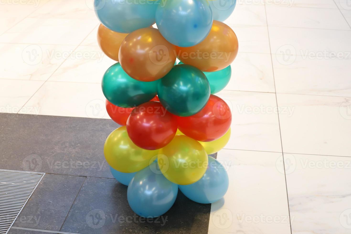 Balloons at a children's party in a city park photo