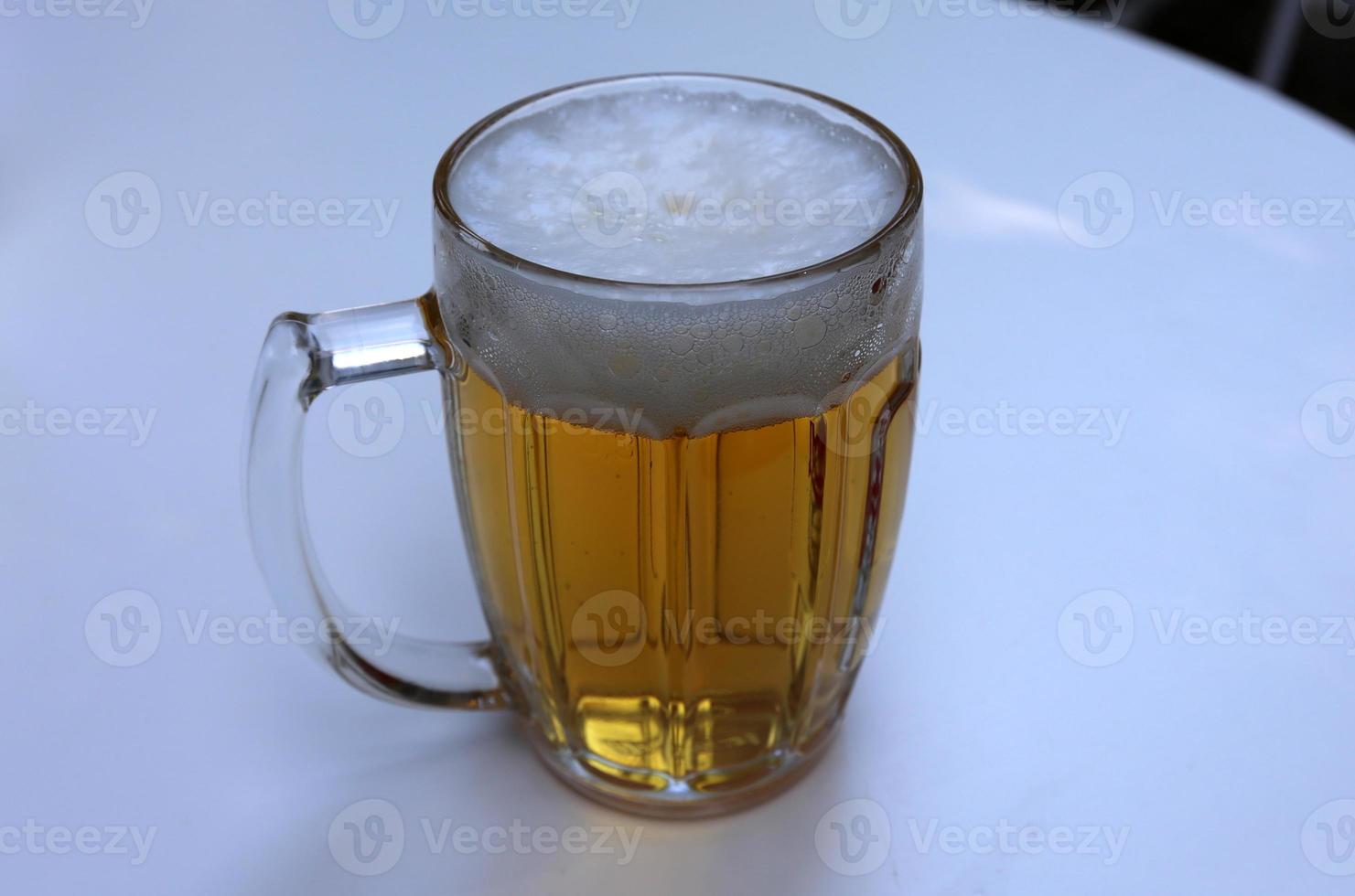 Fresh light beer in a glass. photo