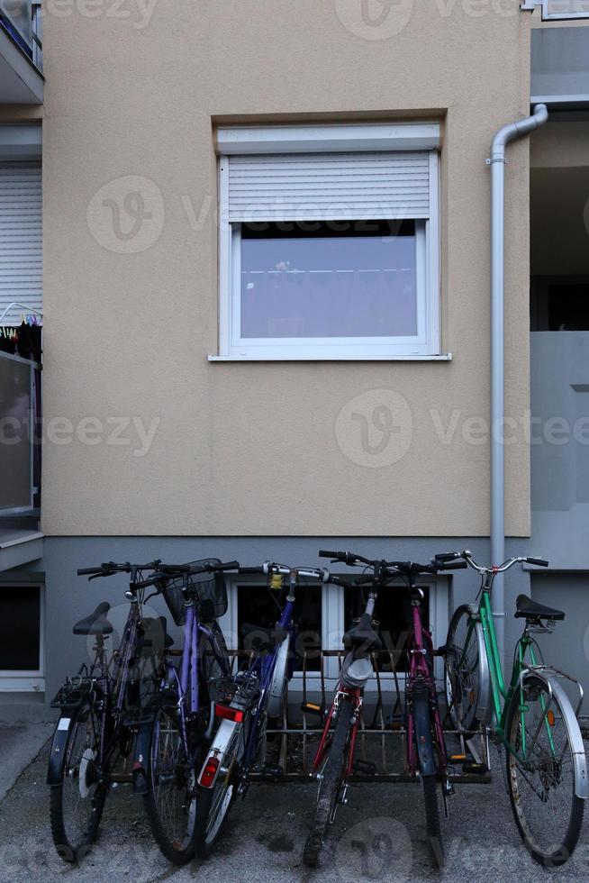 Bicycle stands on the street in a big city photo