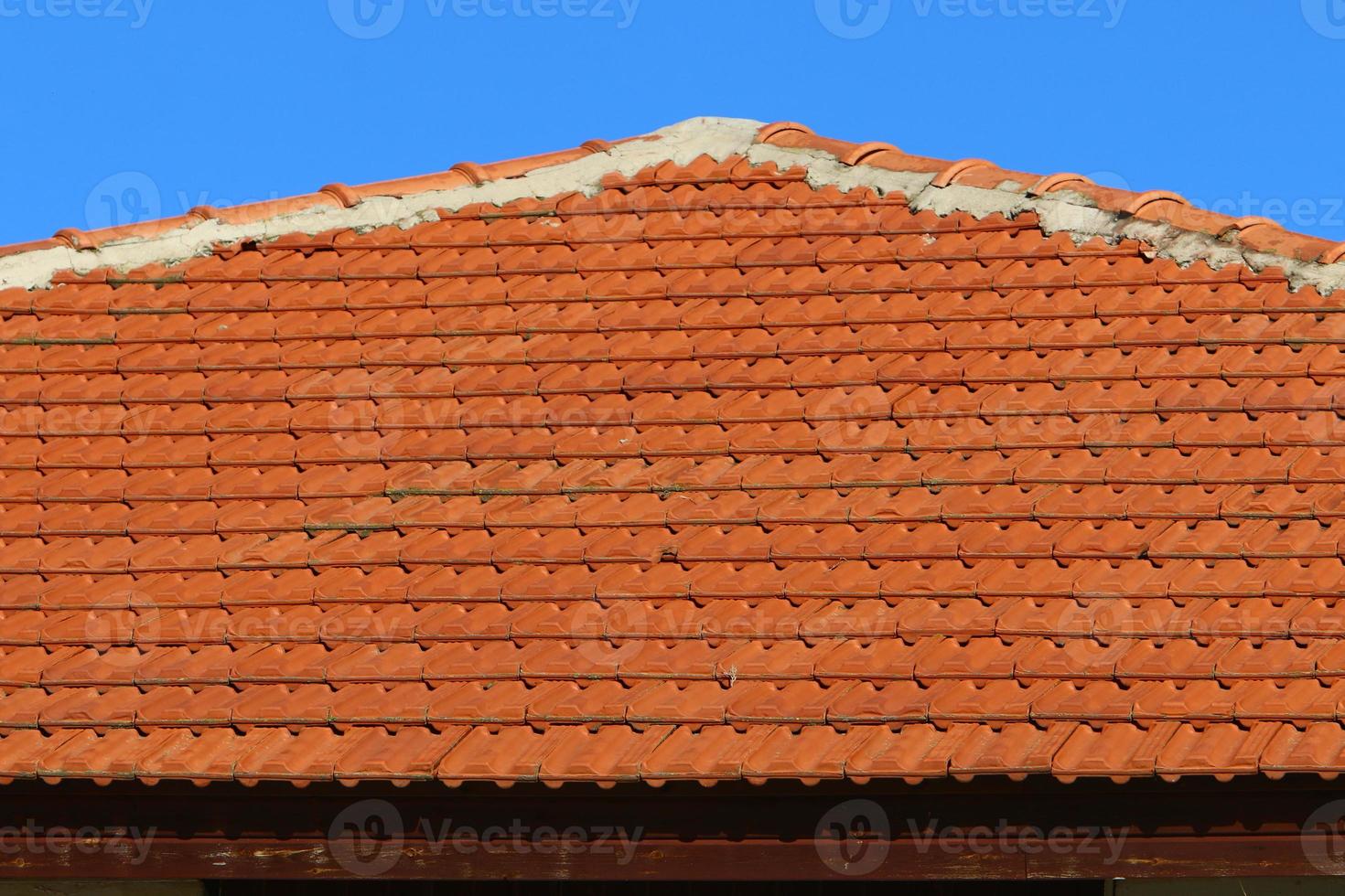 Red tiled roof on a residential building in Israel photo