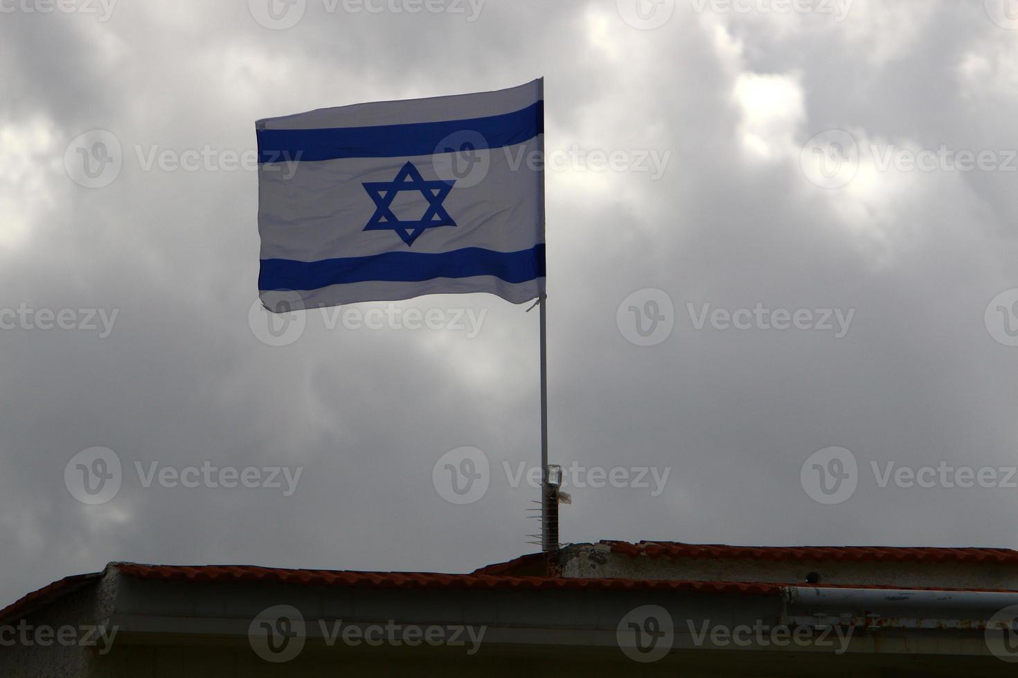 Israeli blue and white flag with the Star of David photo