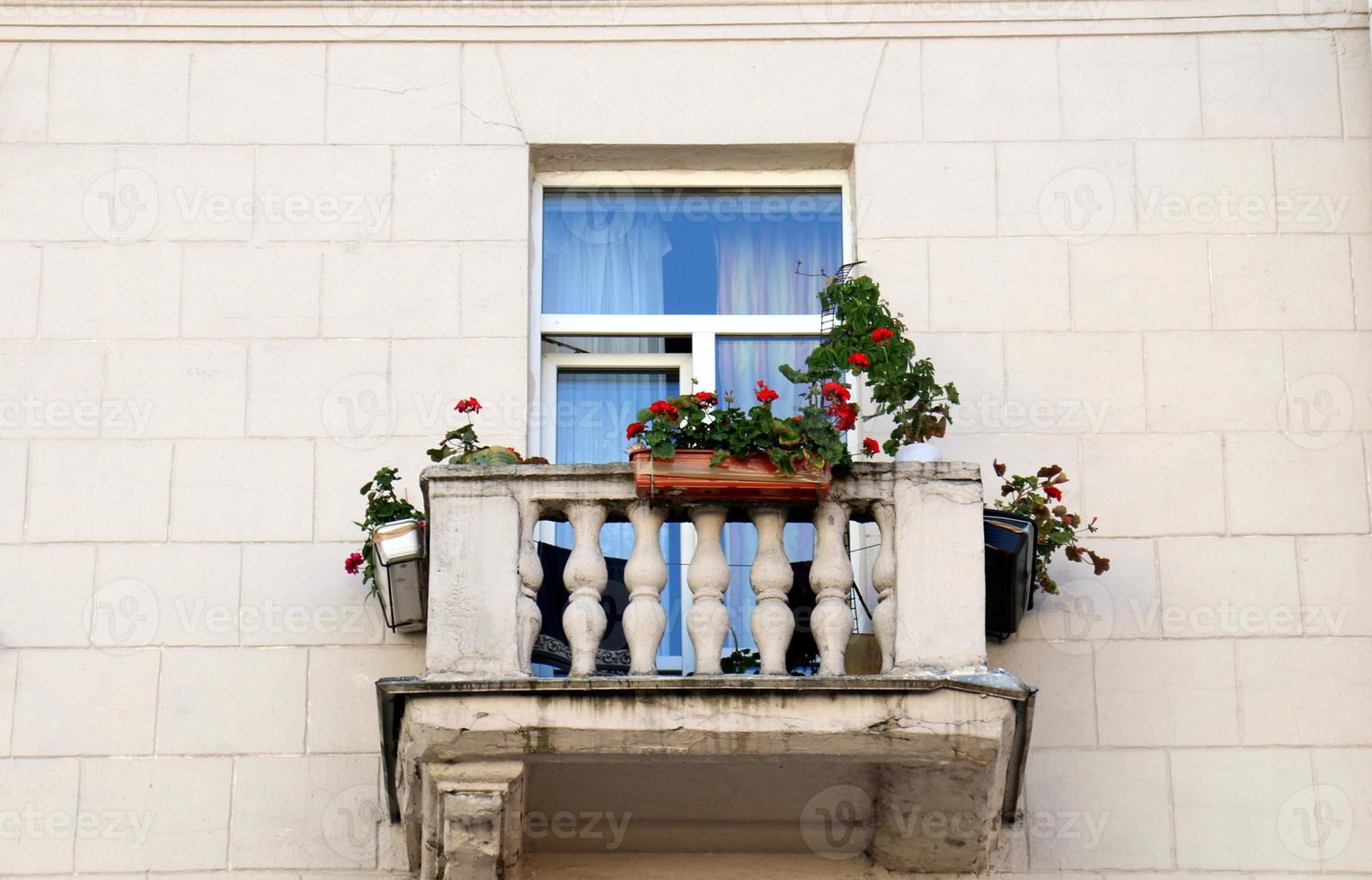 Small balcony on the front of the building photo