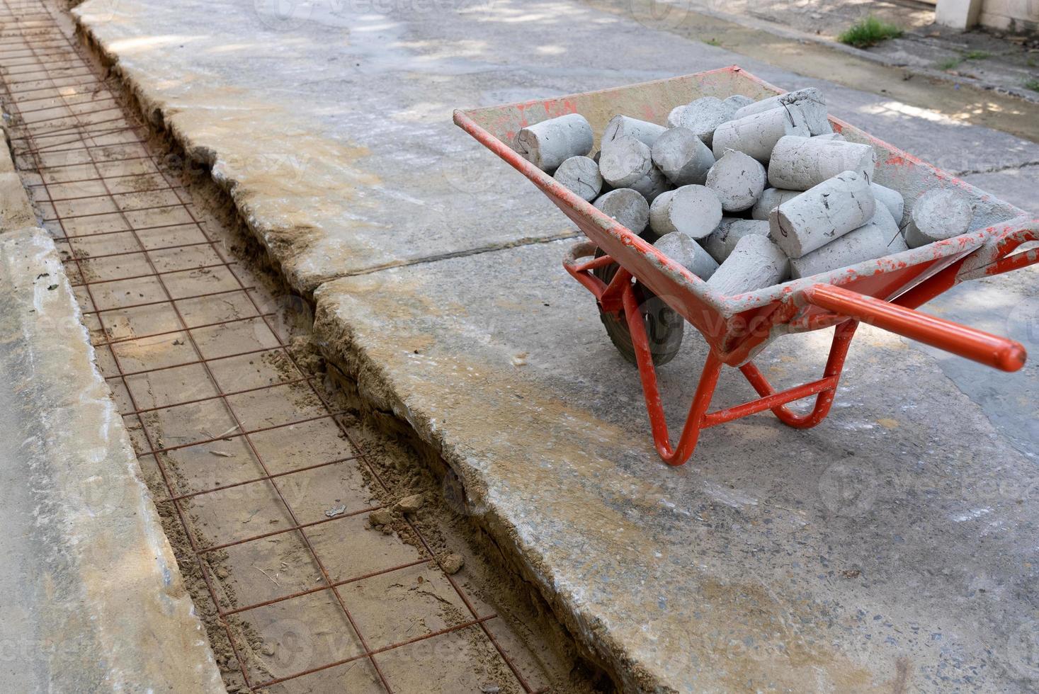 Worker Measure Level of Concrete Slab Wire Mesh That Used For Structural Reinforcement of Road photo