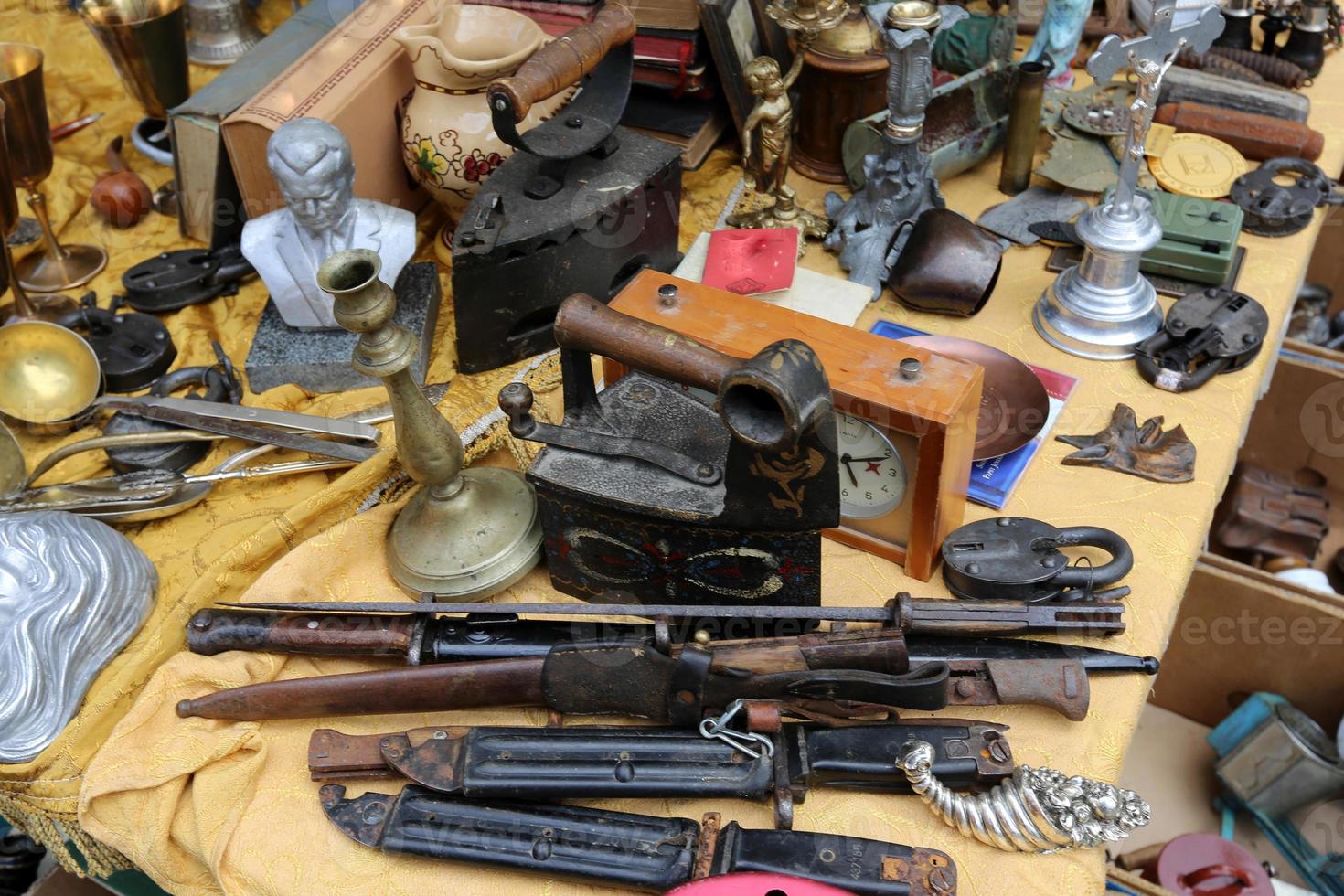 Antiques and tools are sold at the flea market photo