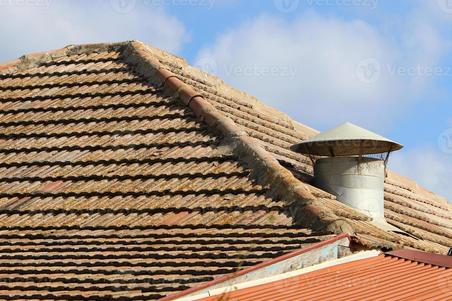 Red tiled roof on a residential building in Israel photo