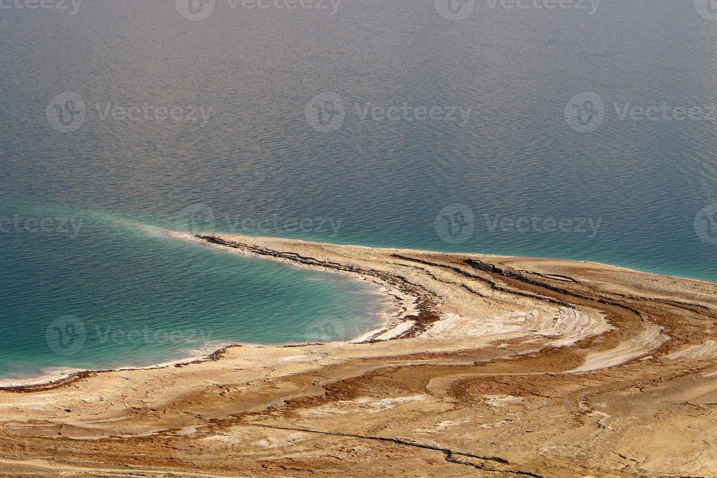 The Dead Sea is a salt lake between Israel, Jordan and the West Bank of the Jordan River. photo