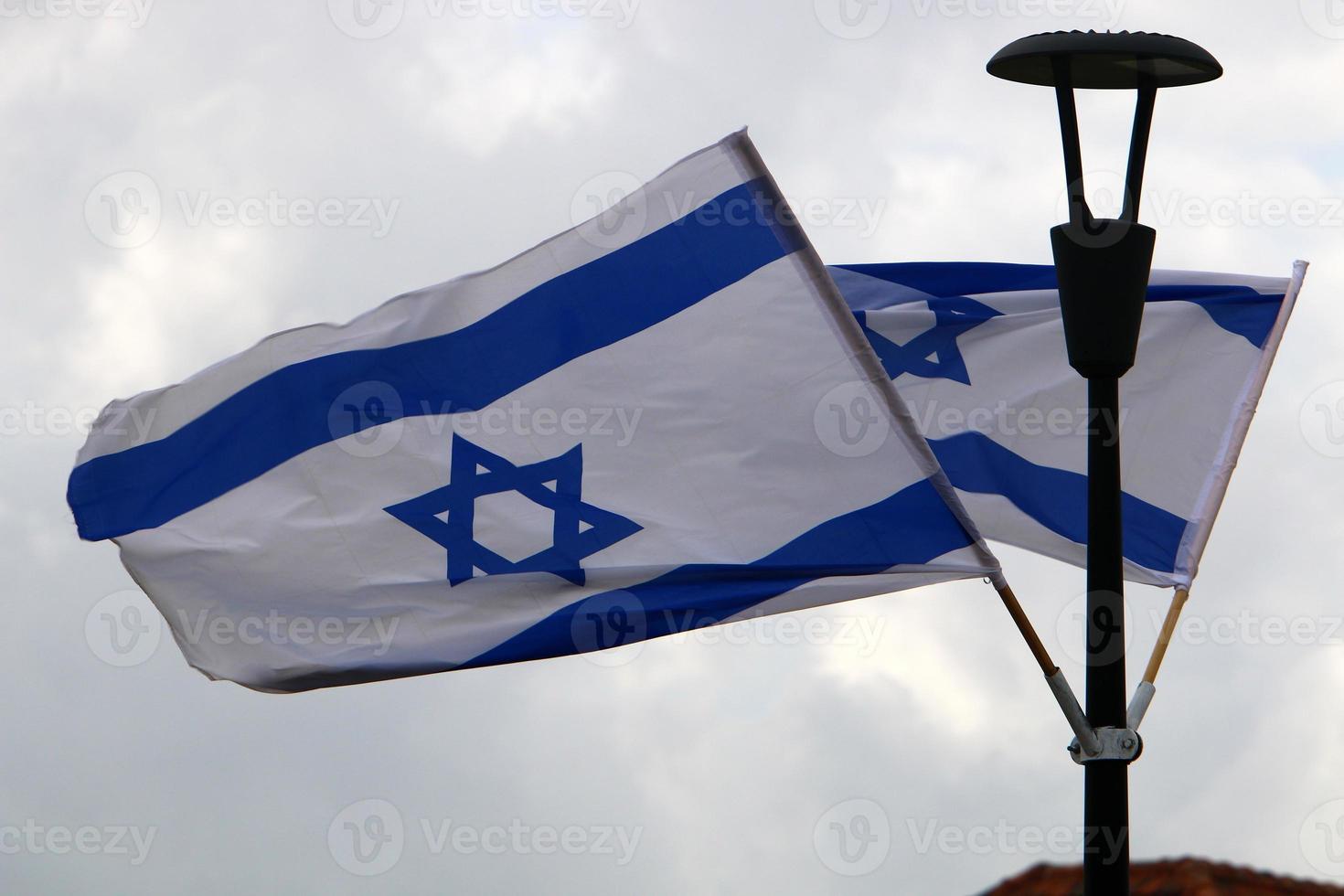 Israeli blue and white flag with the Star of David photo