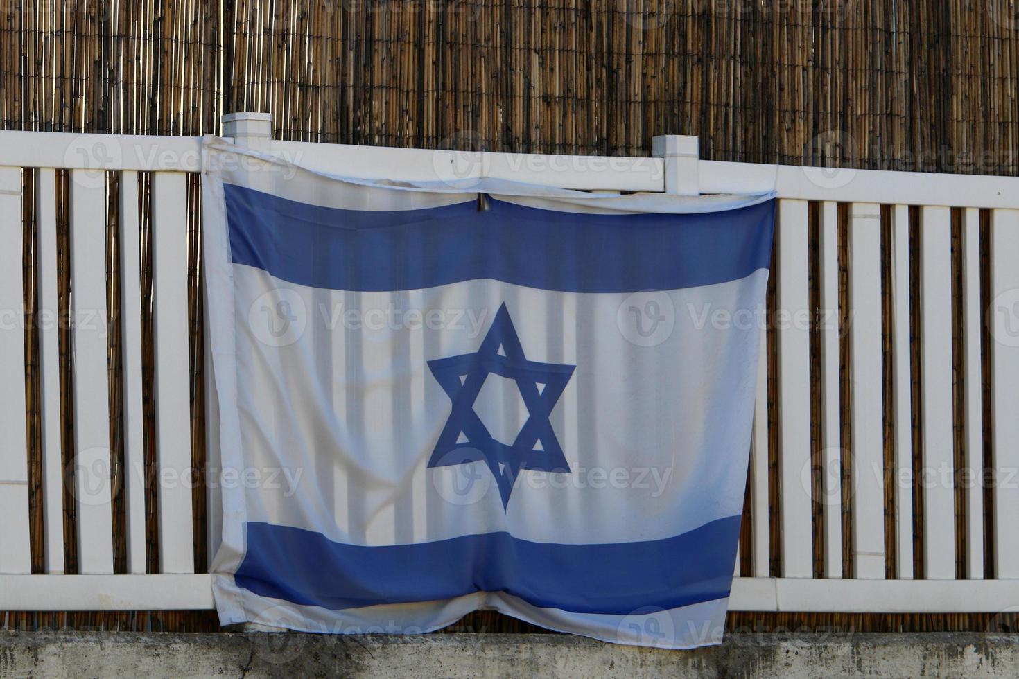 Israeli blue and white flag with the Star of David photo