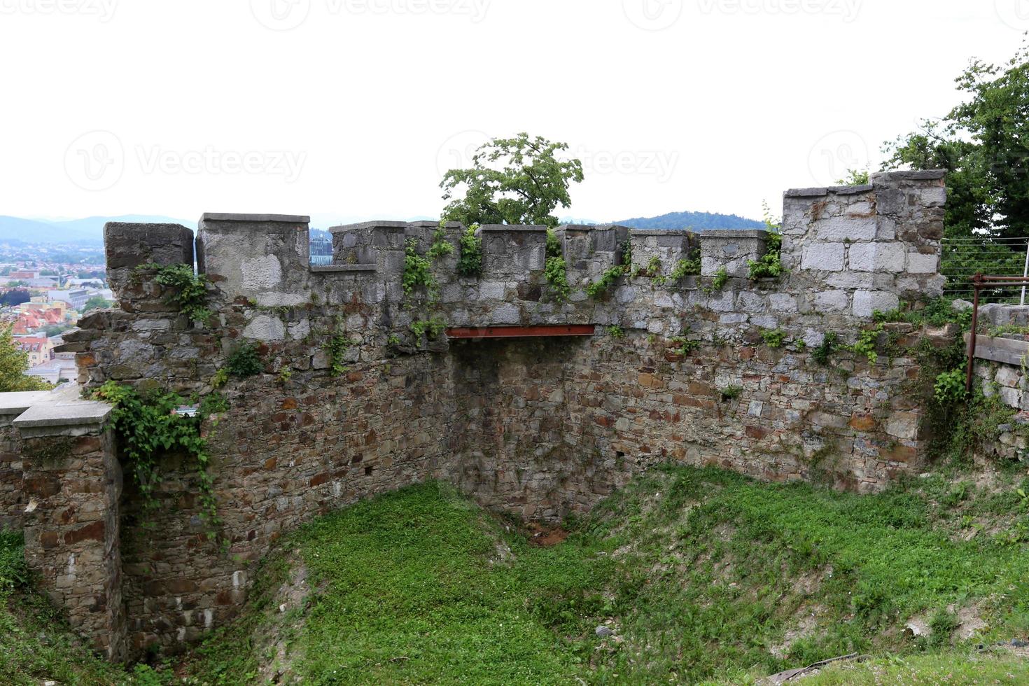 Stone wall of ancient Crusader fortress photo