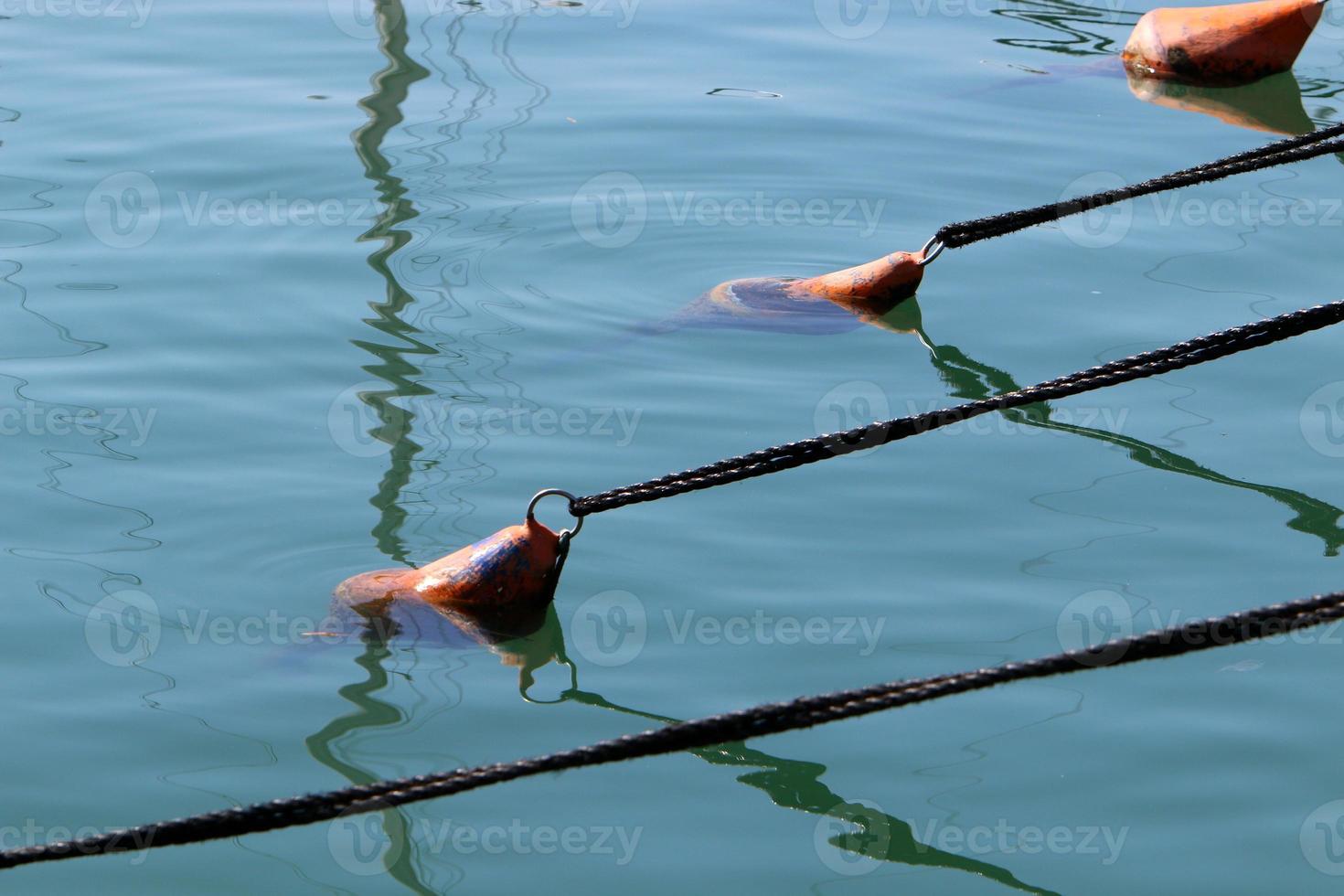 Berth on the seashore for mooring boats and yachts photo