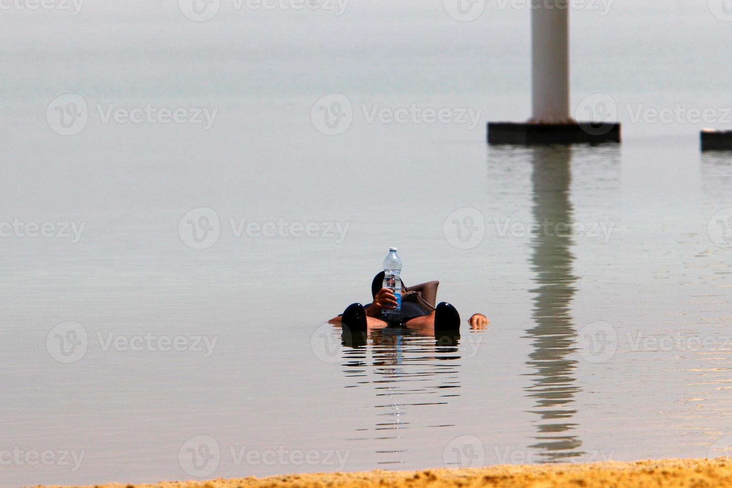 Sandy beach on the Dead Sea in southern Israel photo