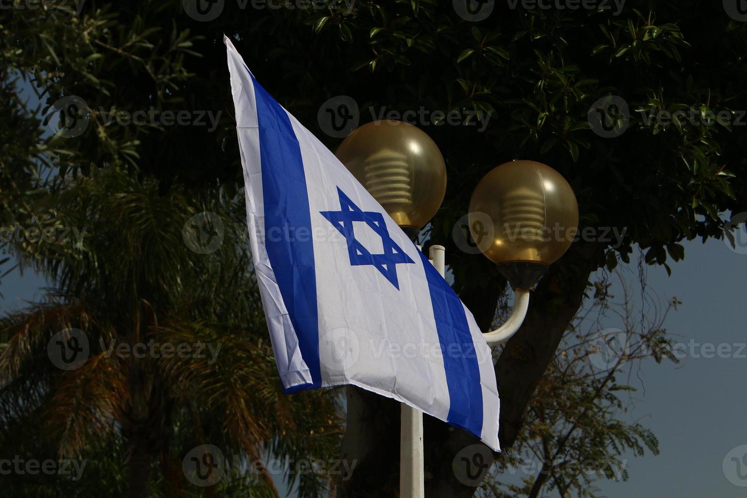 Israeli blue and white flag with the Star of David photo