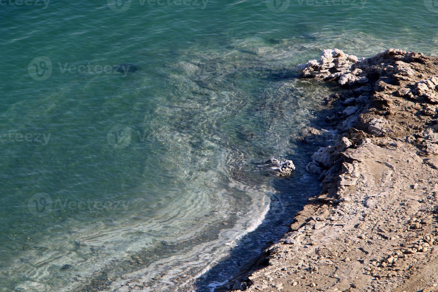 The Dead Sea is a salt lake between Israel, Jordan and the West Bank of the Jordan River. photo