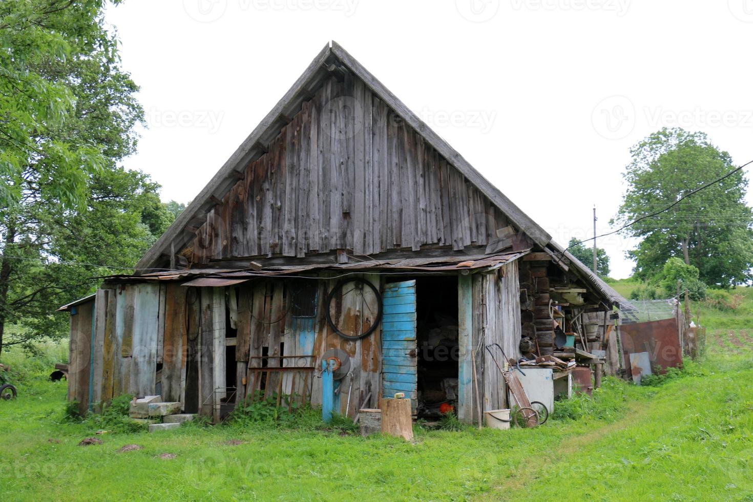 Roof on an old village house in Belarus photo
