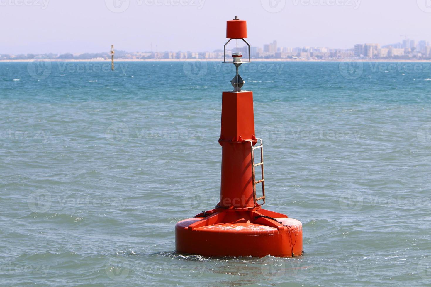 Lighthouse - a means of navigational equipment on the coast of large reservoirs photo