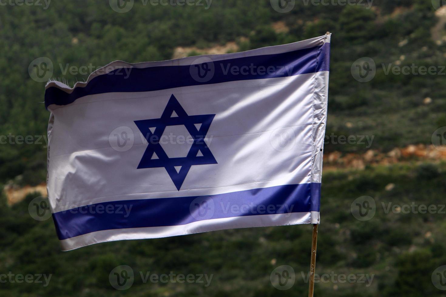 Israeli blue and white flag with the Star of David photo