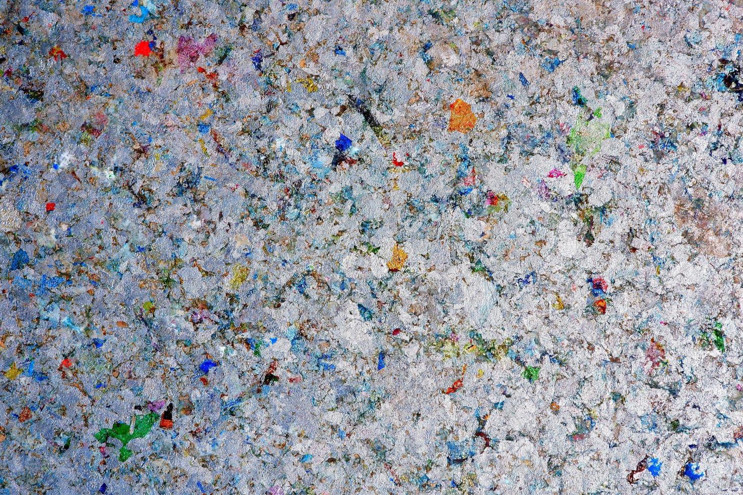 Abstract texture and multicolored of heat resistant gypsum board background made of pasteurized milk carton box, recycle and reuse for wall and ceiling materials in home decoration design concept photo