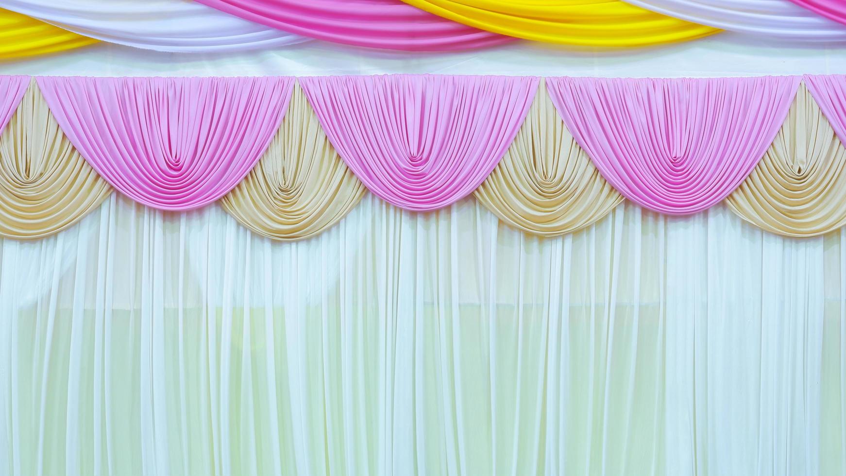Pink, white and yellow stage curtain decoration background photo