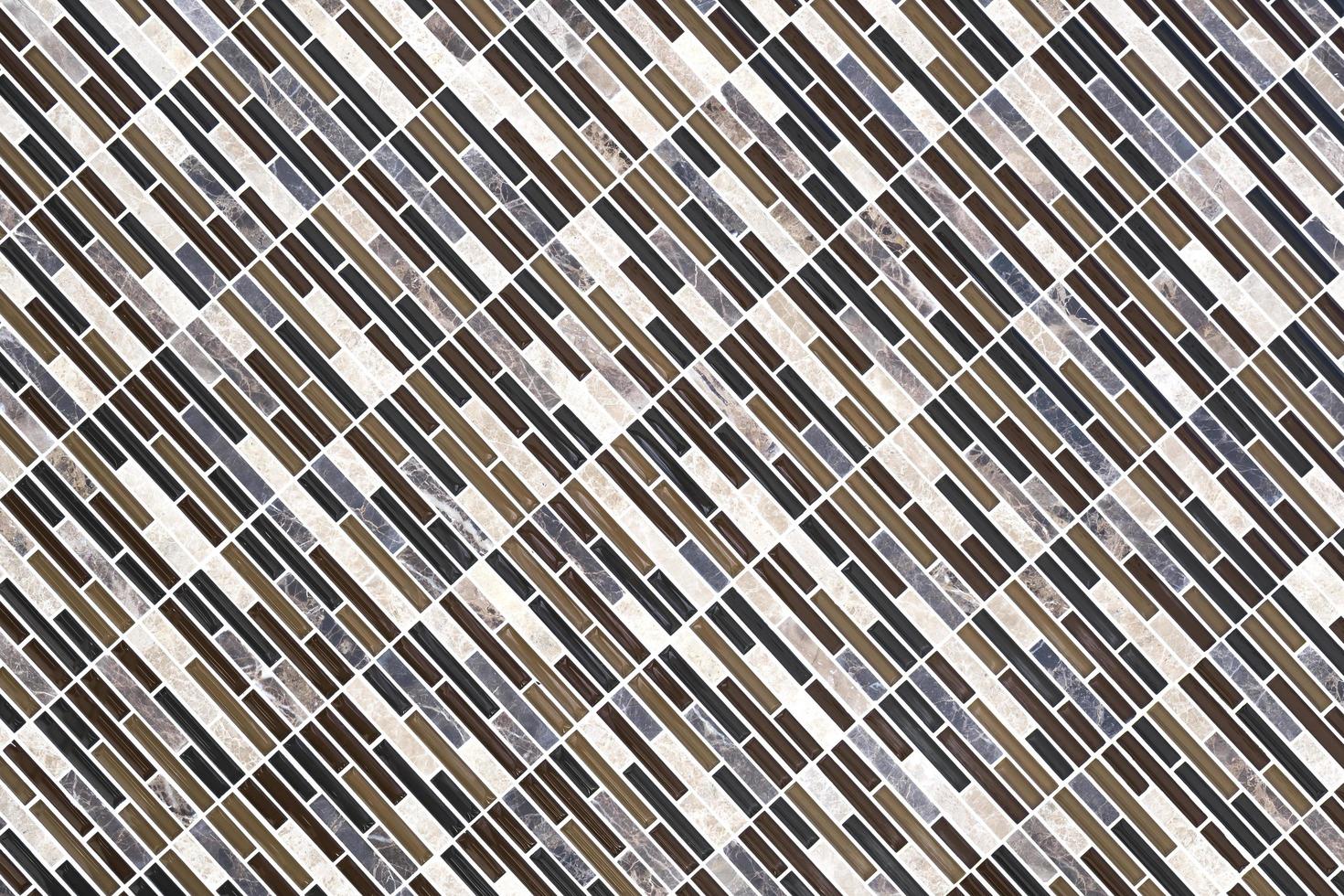 Diagonal abstract rectangle pattern of mosaic with marble tiles wall background in brown tone style photo