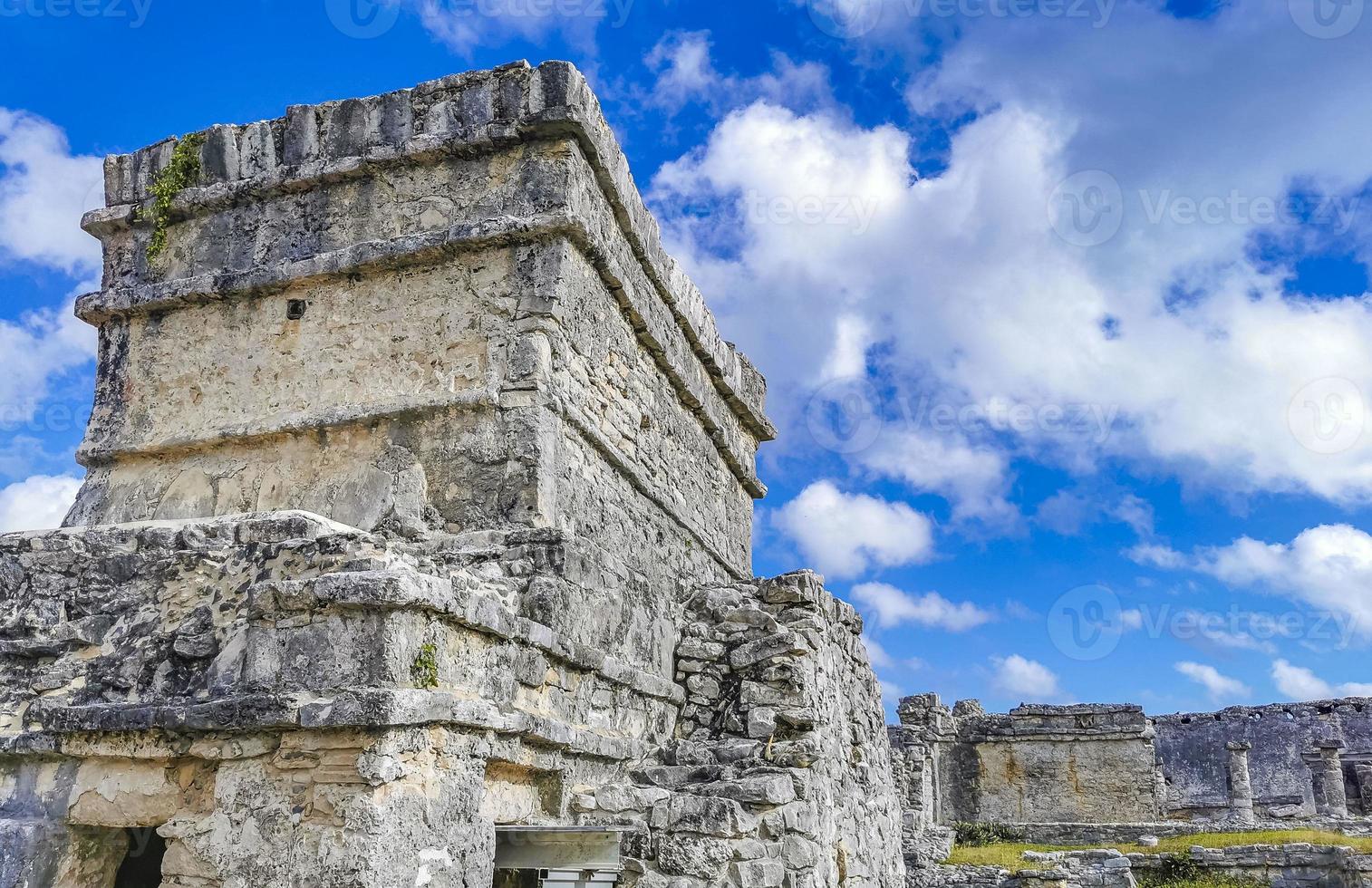 Ancient Tulum ruins Mayan site temple pyramids artifacts seascape Mexico. photo