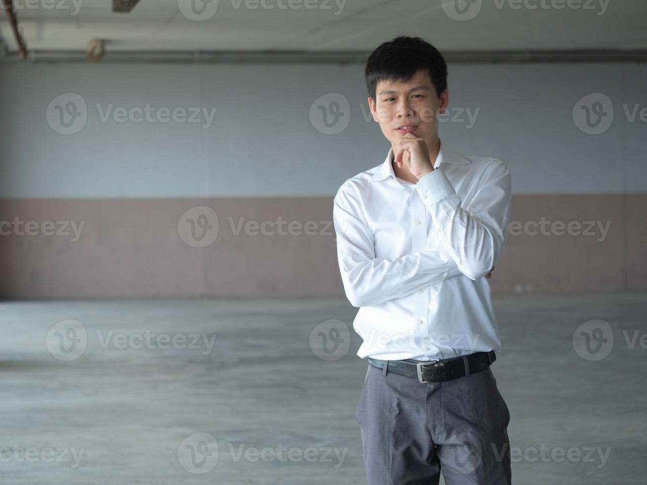 Businessman manager casual formal wear white shirt look at camera arm crossed.Male young adult portrait smart handsome idea work job occupation professional.White isolate studio background copy space photo