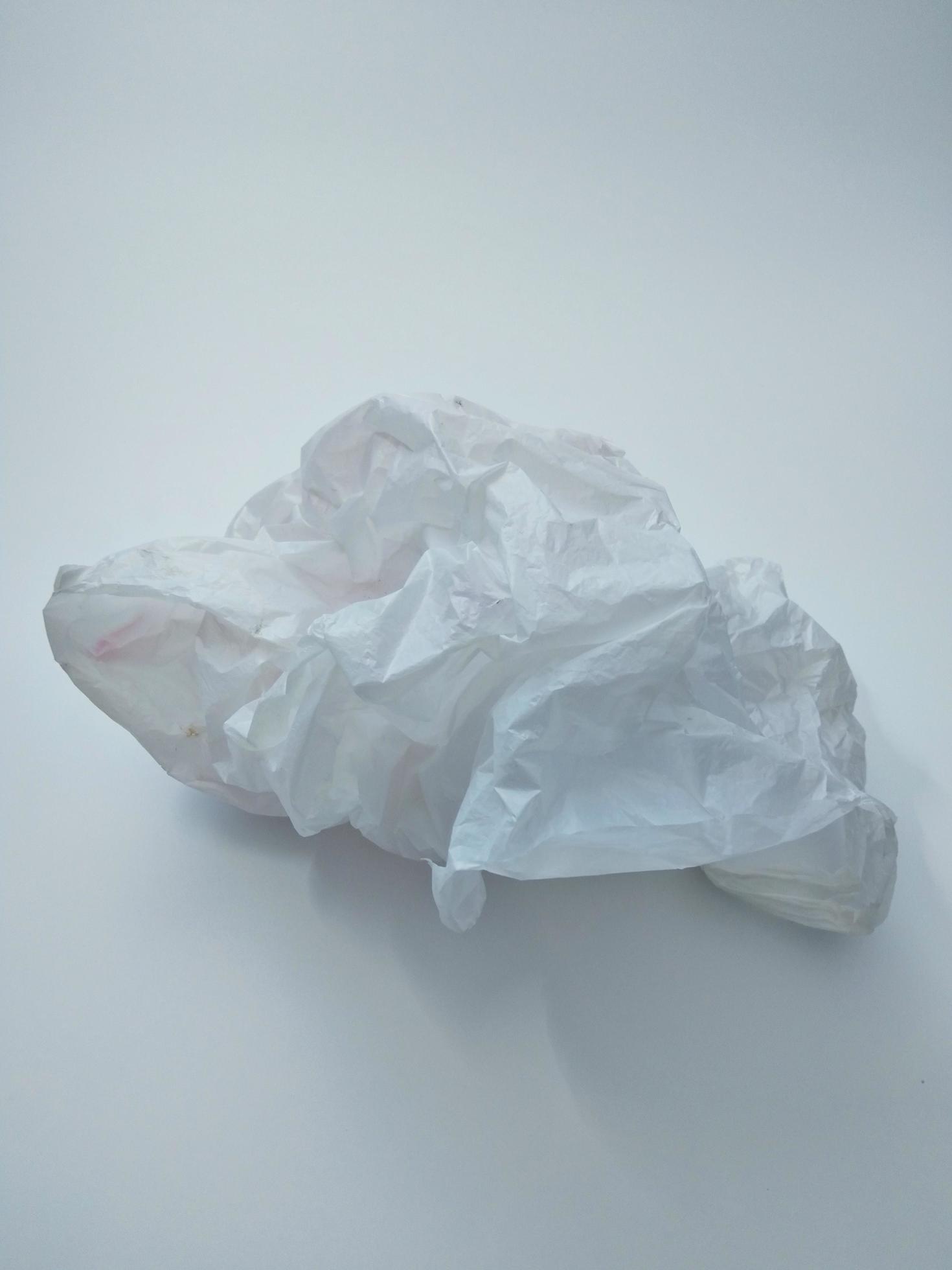 Crumpled Used Transparent Plastic Bag Isolated On White Background