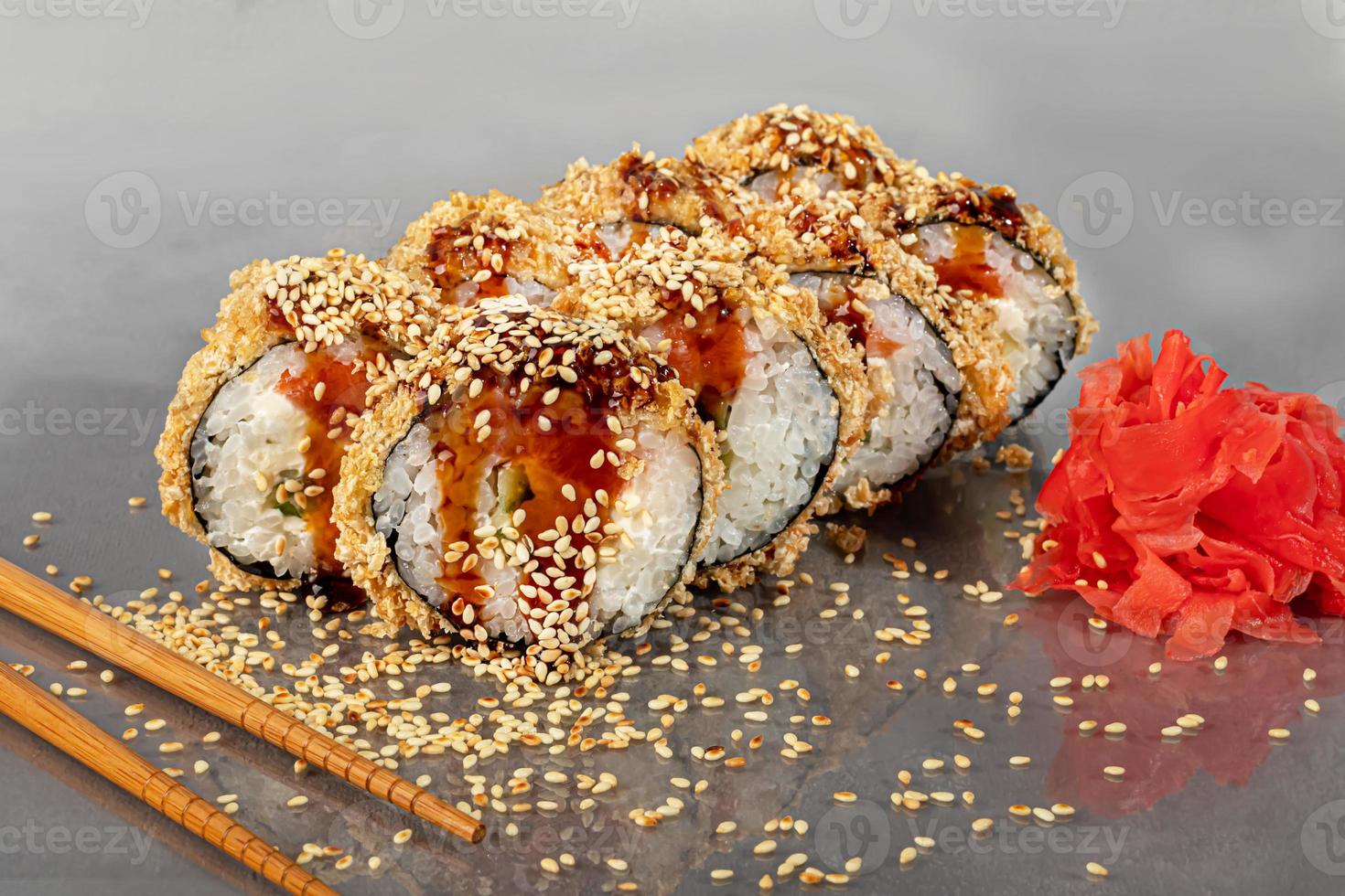 Sushi sets Uramaki, California, Philadelphia, rolls on a white plate. Menu for restaurants, cafes. On a dark reflective background. photo