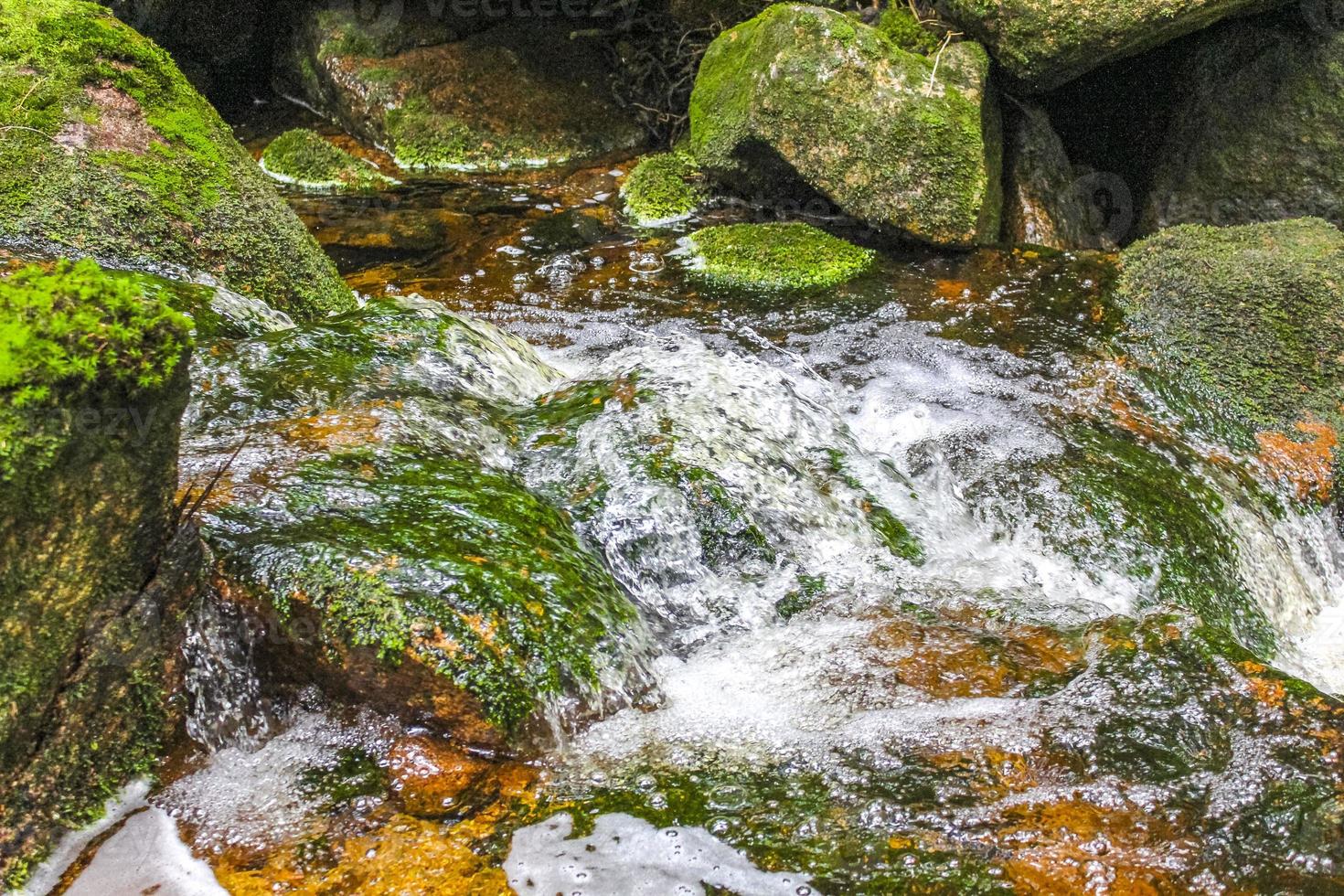 Small waterfall river and stream on Brocken mountain Harz Germany. photo