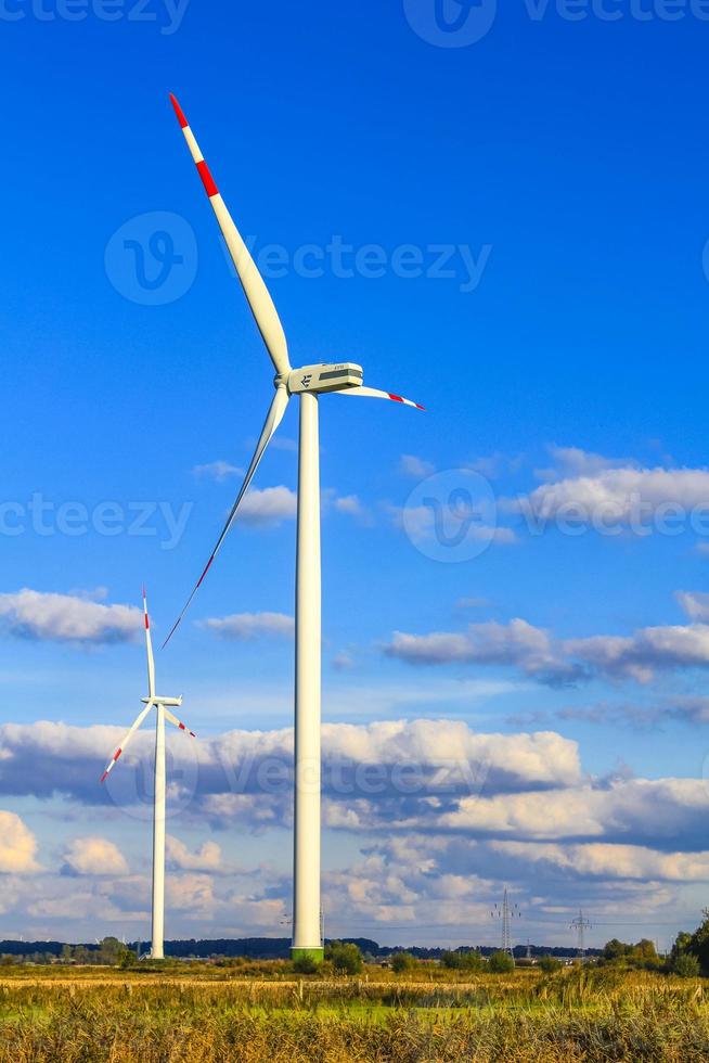 North German agricultural field wind turbines nature landscape panorama Germany. photo