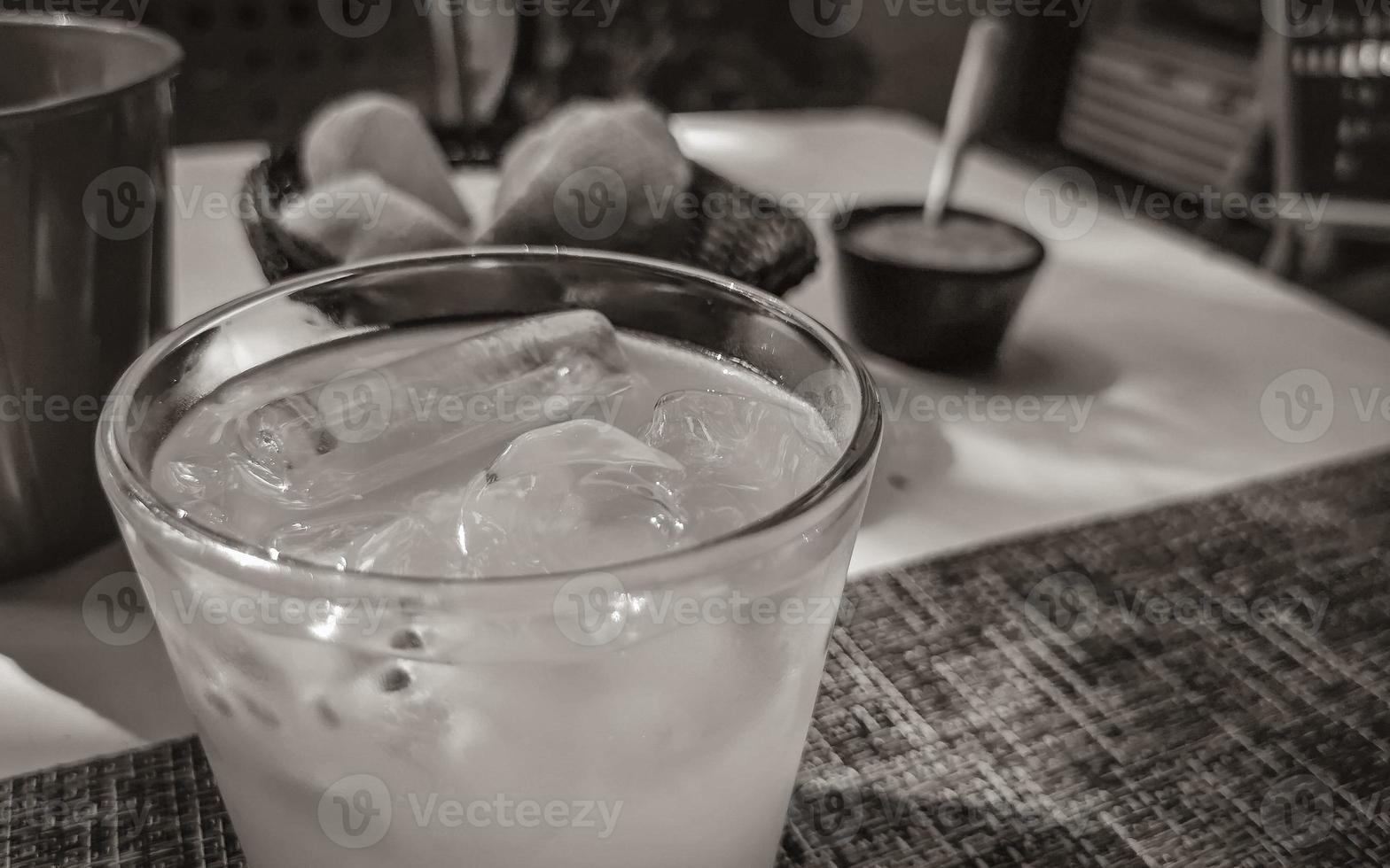 Passion fruit juice in restaurant PapaCharly Playa del Carmen Mexico. photo