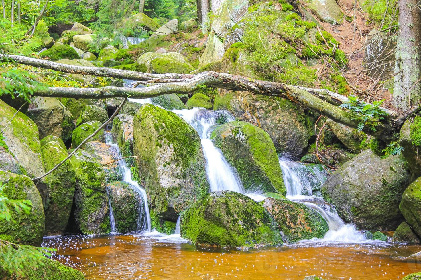 Small waterfall river and stream on Brocken mountain Harz Germany. photo