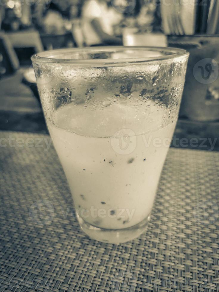 Guanabana fruit juice in restaurant PapaCharly Playa del Carmen Mexico. photo