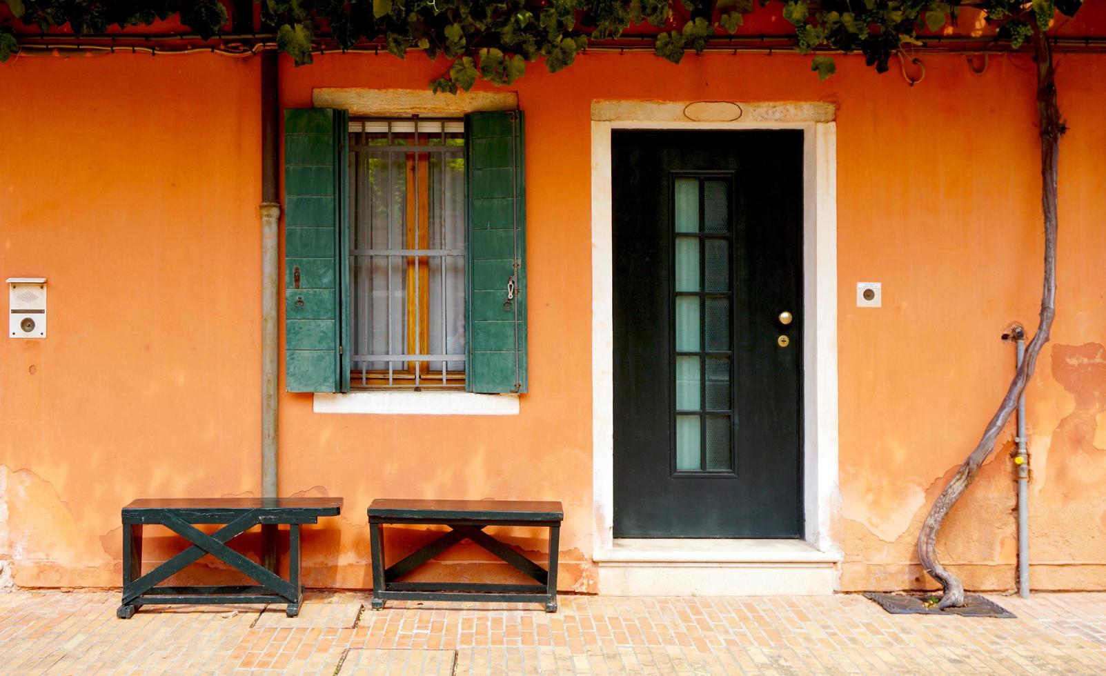 door and window in front of house building photo