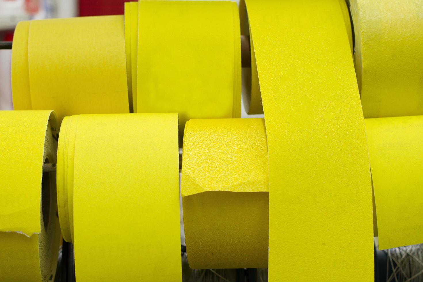 Background of adhesive yellow tape set. Selective focus. photo