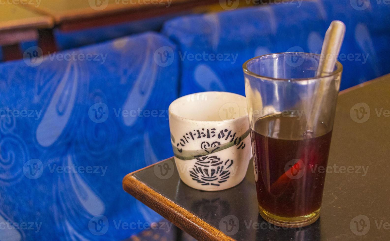 Black coffee in glass or cup Agra India. photo