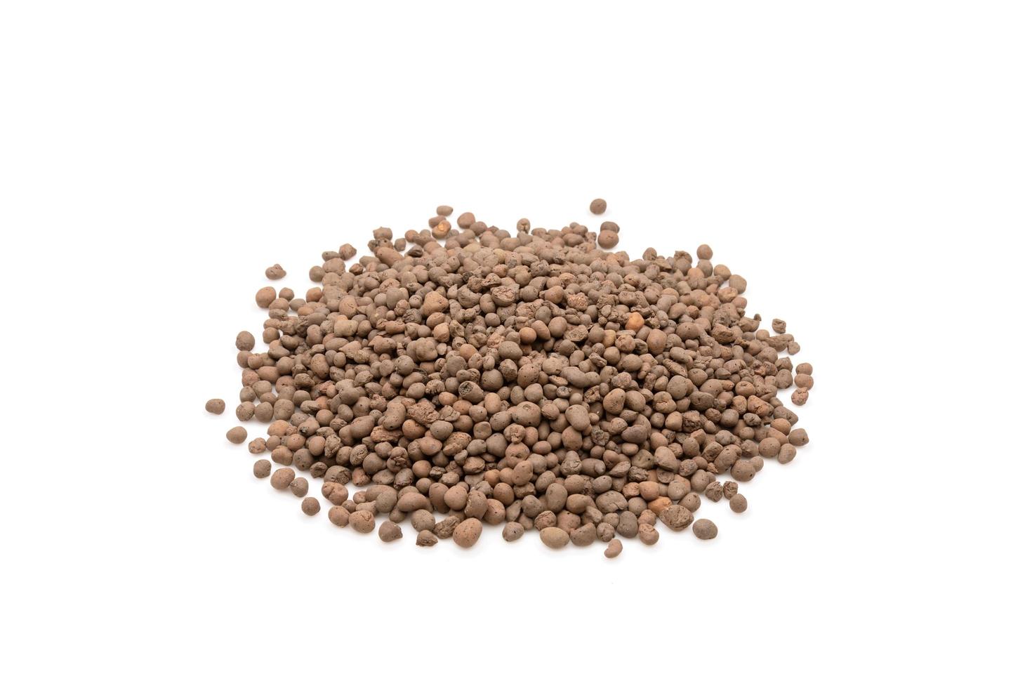 Pile of Leca Ball or Hydroton clay tablets for plant isolated on white photo