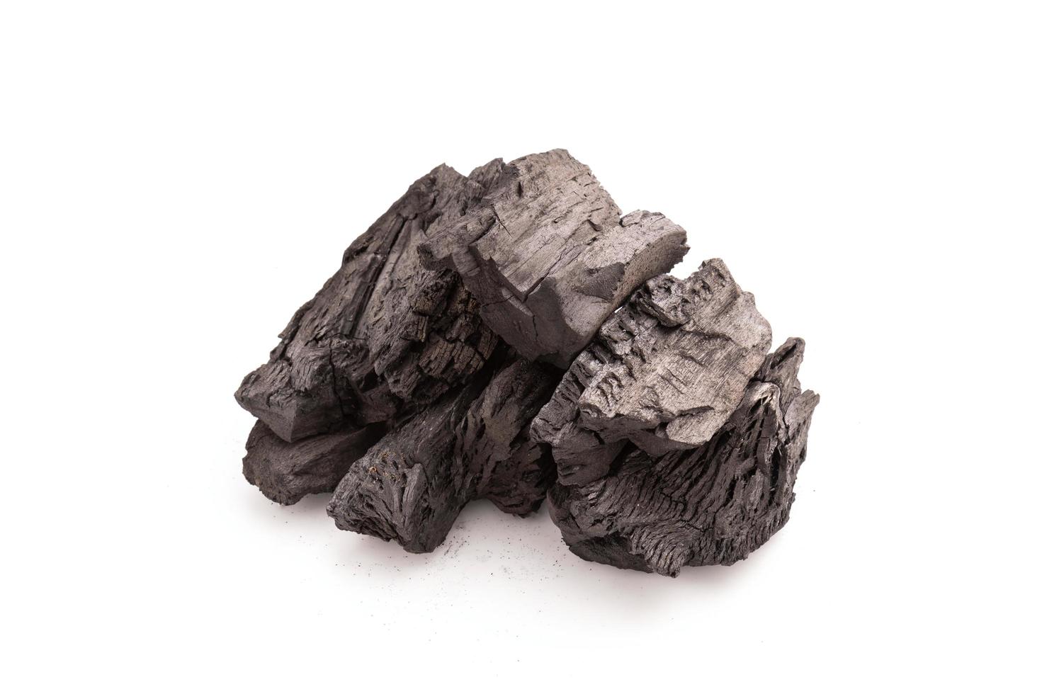 Stack of Charcoal isolated on white photo