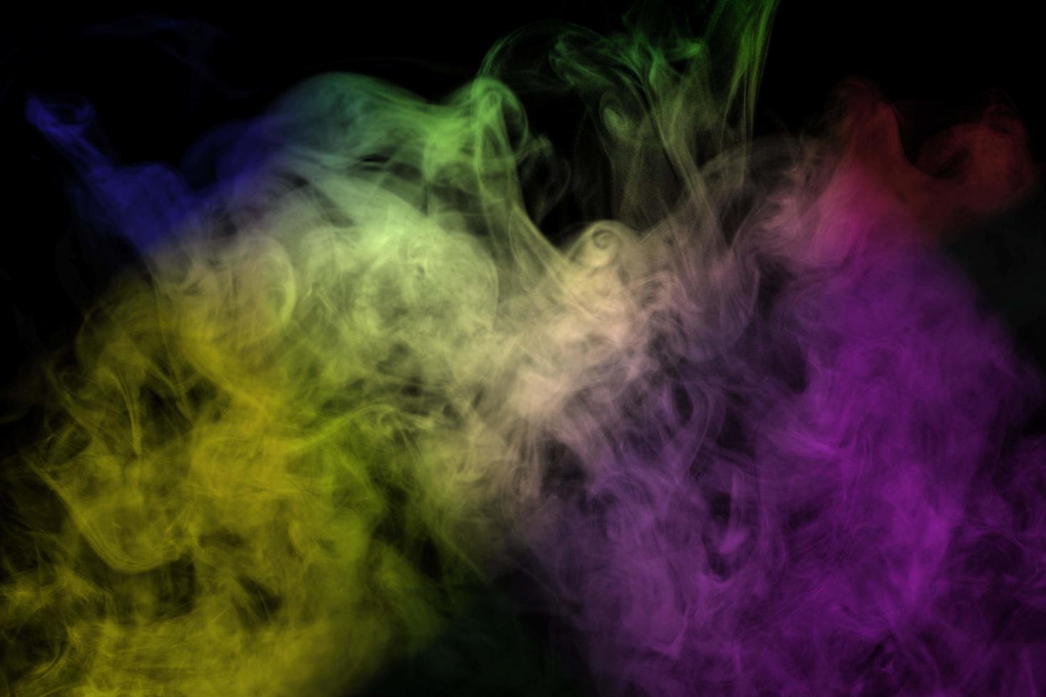 Abstract smoke isolated on black background,Rainbow powder photo