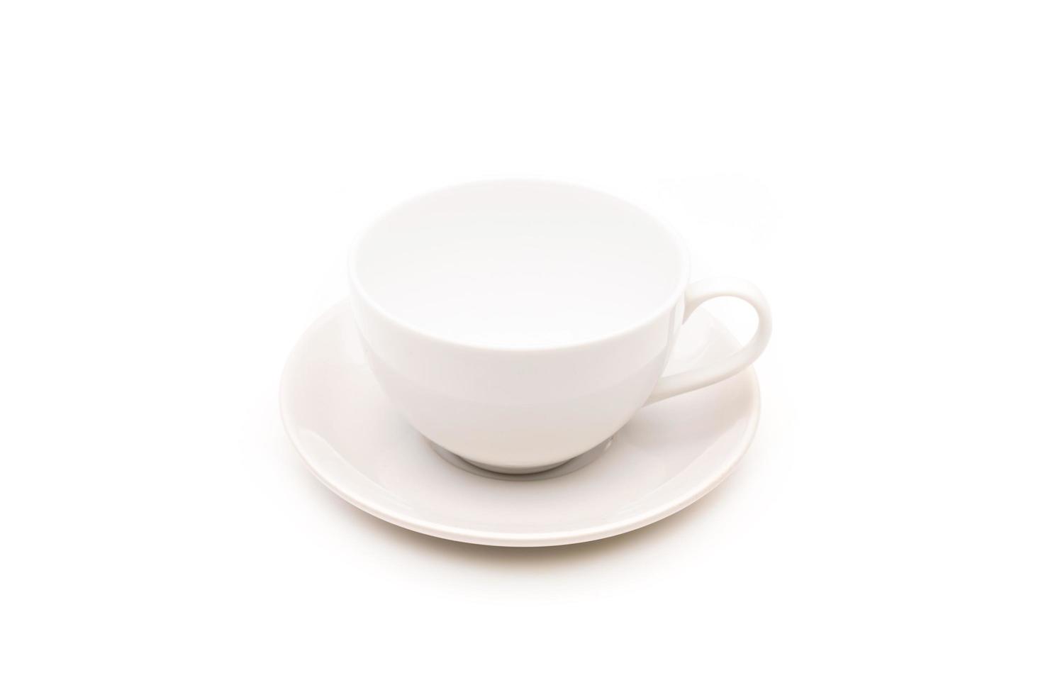 White ceramic cup for coffee or tea isolated on white photo