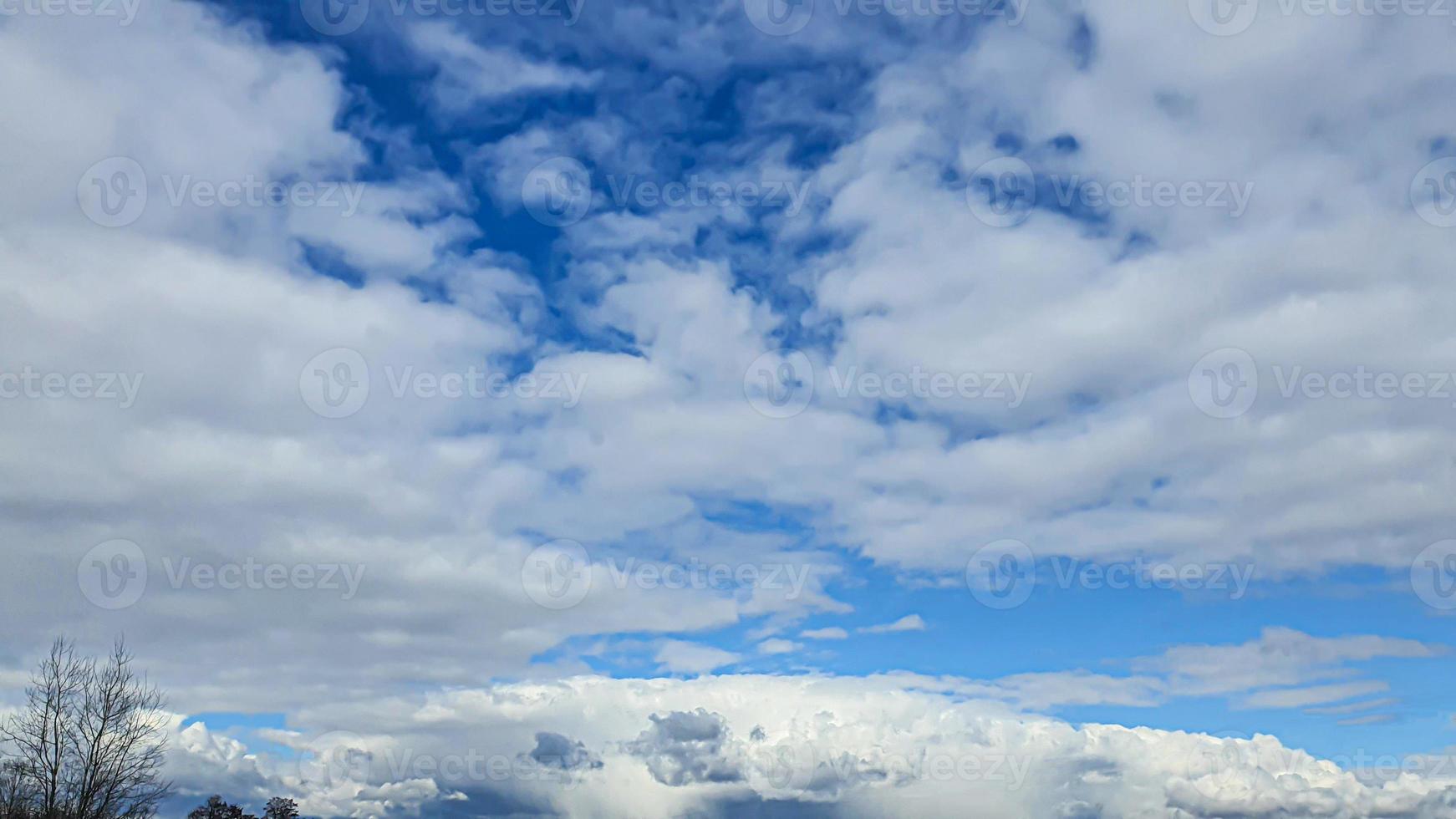 Blue sky with clouds. Road, exit from the occupied territories. War in Ukraine. Escape from the aggressor. photo