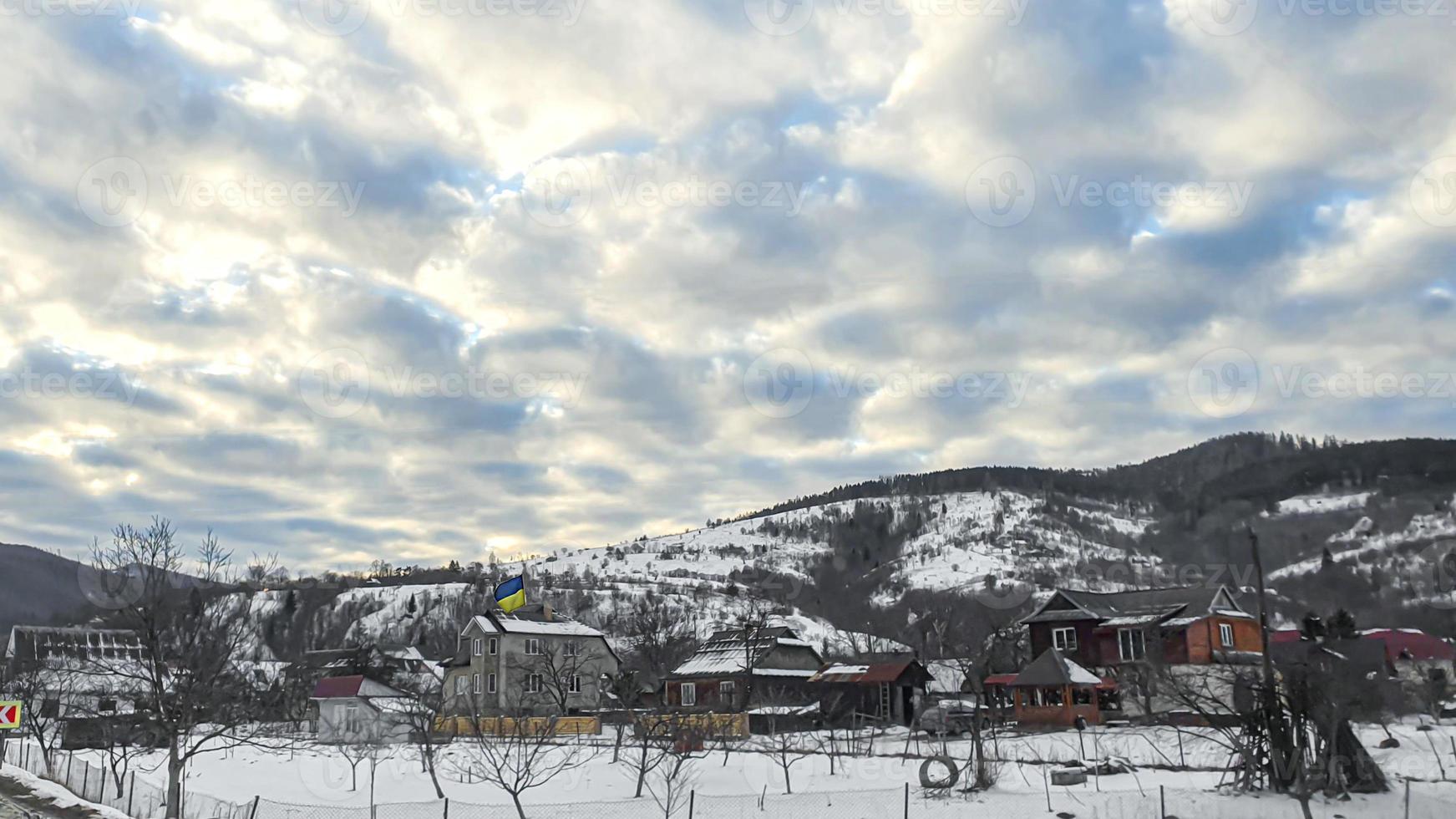 Blue sky with clouds. Road, exit from the occupied territories. War in Ukraine. Escape from the aggressor. photo