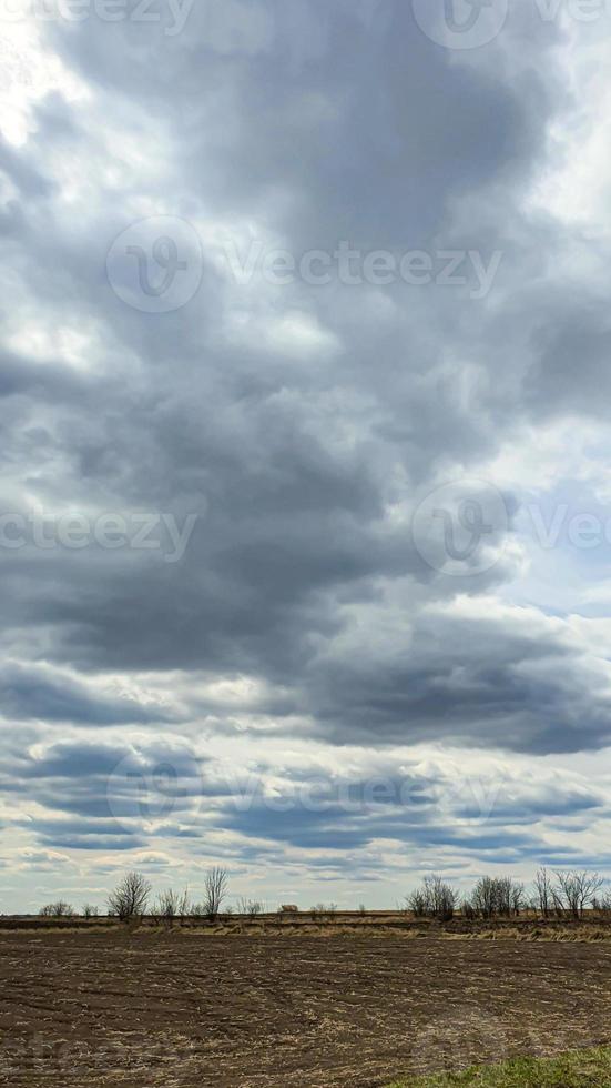 Blue sky with clouds. Road, exit from the occupied territories. War in Ukraine. Escape from the aggressor. photo