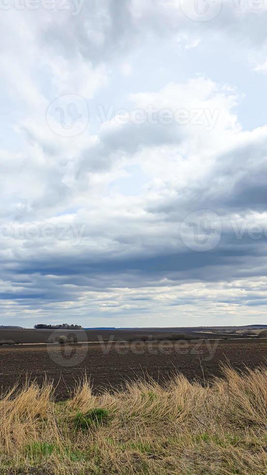 Blue sky with clouds. Road, exit from the occupied territories. War in Ukraine. Escape from the aggressor. photo