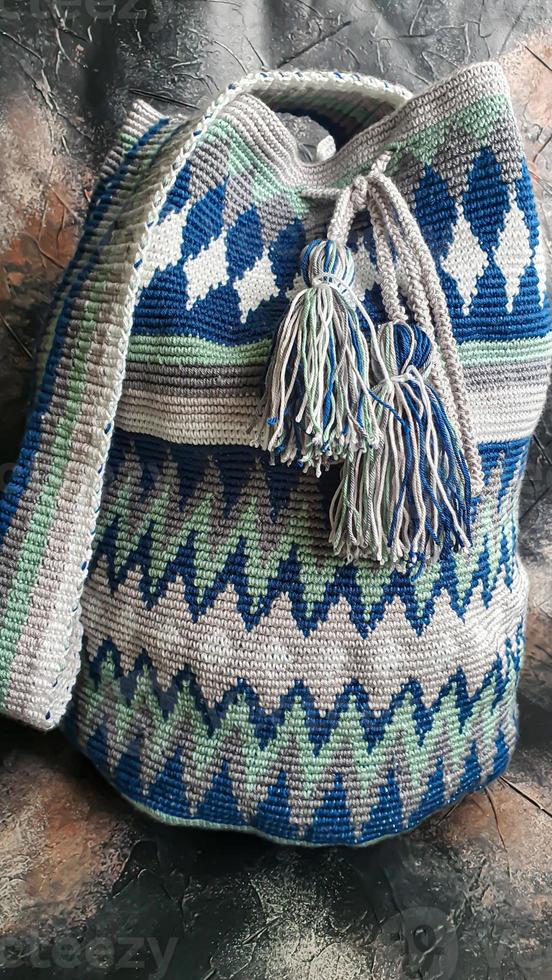 Handmade bags. Knitted from colored threads. Volumetric and comfortable to wear with a long handle. photo