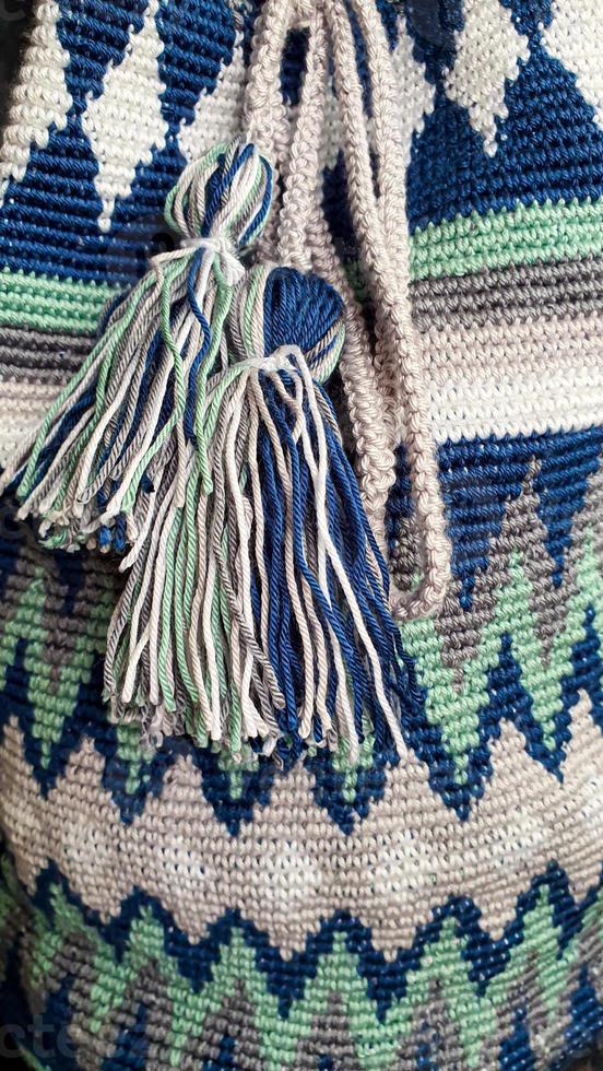 Handmade bags. Knitted from colored threads. Volumetric and comfortable to wear with a long handle. photo