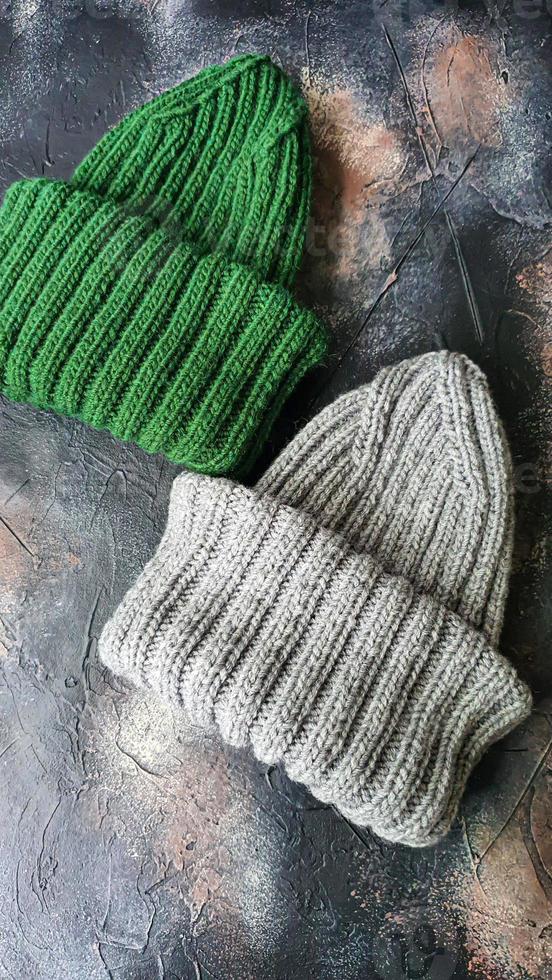 Handmade balaclava with Ukrainian symbols. Knitted from gray and green threads. Warms, reliably saves from the cold. photo