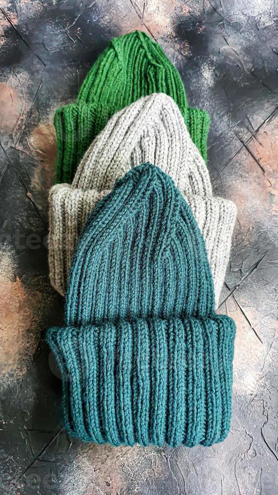 Handmade balaclava with Ukrainian symbols. Knitted from gray and green threads. Warms, reliably saves from the cold. photo
