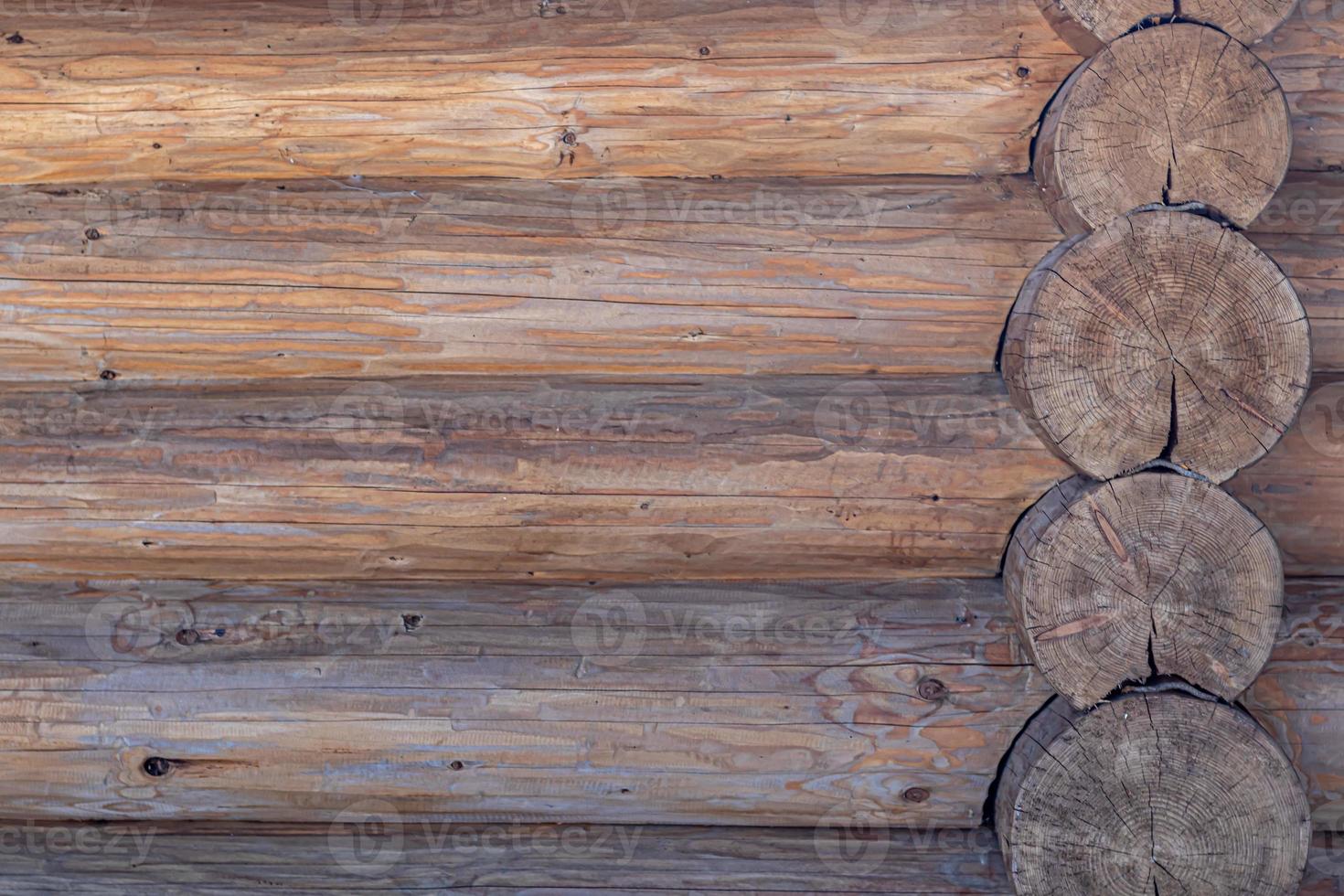 Diverse wooden surface. The walls of the houses are made of wood. Boards for background and construction photo