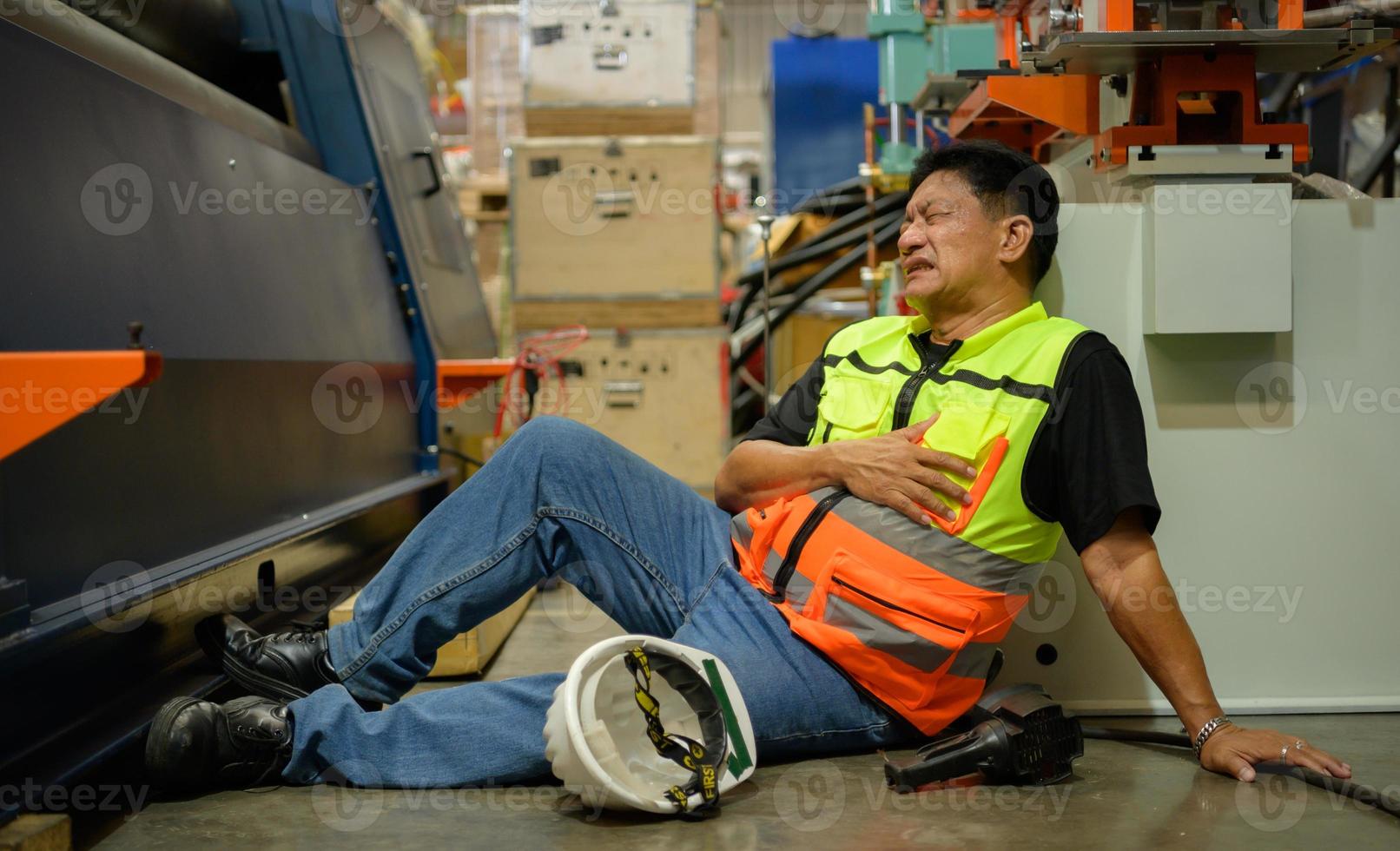 Factory worker Working hard until the symptoms of congenital disease exacerbate photo